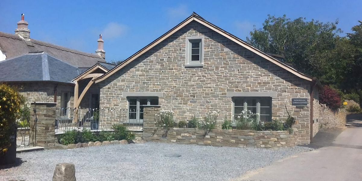 stone cladding on a new build in Devon