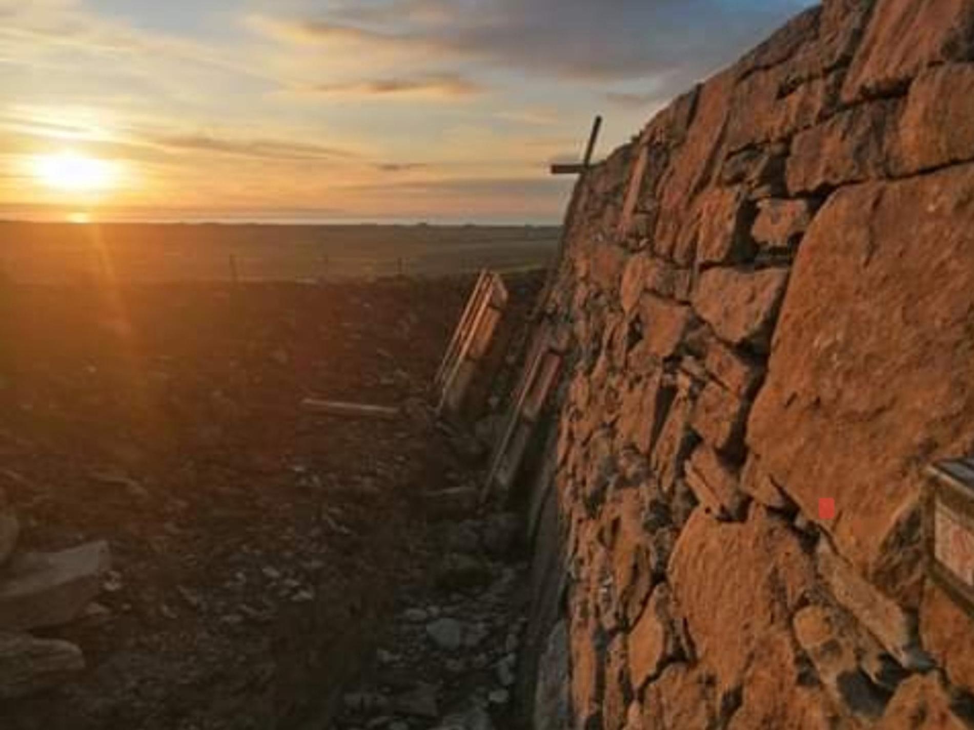 dry stone wall at sunset